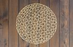 Round Rope Napkin Or Stand On A Wooden Rustic Table. To Create A Stock Photo