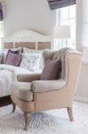 Classic Chair On Carpet With Pillow Stock Photo