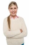 Confident Teenage Girl Posing With Folded Arms Stock Photo