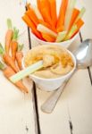 Fresh Hummus Dip With Raw Carrot And Celery Stock Photo