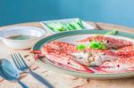 Steamed Crab Dish On A Wooden Table Stock Photo