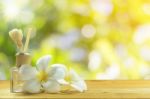 Bottle-conditioned With Plumeria Stock Photo