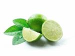 Limes With Leaves Stock Photo