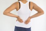 Woman Suffering From Back Pain Or Spine Pain,woman Healthcare Concept And Ideas Stock Photo