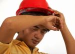 Exhausted Construction Worker Stock Photo