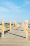 Boardwalk Entering The Beach Stock Photo