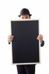 Businessman Holding A Blackboard Stock Photo