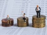 Miniature Businessman Stand On Book Bank, Near Pile Of Coins. Bu Stock Photo