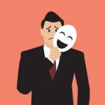 Fake Businessman Holding A Smile Mask Stock Photo