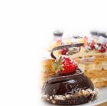 Selection Of Fresh Cream Cake Dessert Plate Stock Photo