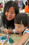 Child Painting Stock Photo