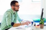 Handsome Businessman Working With Laptop In Office Stock Photo