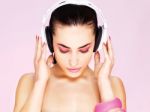 Woman With Headphones Stock Photo