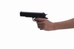 Hand Of Woman With Gun On White Background Stock Photo