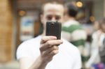 Man Taking Photo With Mobile Phone Stock Photo