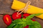 Italian Spaghetti Pasta Tomato And Basil Stock Photo