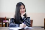 Portrait Of Thai Teen Beautiful Girl Writing Book Stock Photo