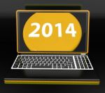 Two Thousand And Fourteen On Laptop Shows New Year Resolution 20 Stock Photo