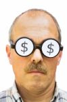 Man With Dollar Signs On His Glasses Stock Photo