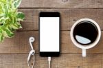 Smartphone White Screen On Wooden Table, Mockup Modern Smartphon Stock Photo