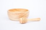 Wooden Bowl And Dipper On White Background Stock Photo