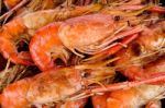 Close Up Grilled Shrimp With Flames Stock Photo