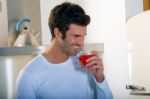 Man Drinking Juice Stock Photo