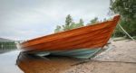 Rowing Boat Moored On Loch Insh Stock Photo