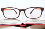 Eyeglasses Closeup With Book Stock Photo