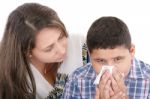 Child Blowing Her Nose Stock Photo