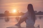 Silhouette Of Relaxing Young Woman Stock Photo