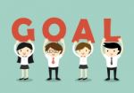 Business Concept, Businessmen And Business Women Holding 'goal' Letters, Goal And Teamwork Concept Stock Photo