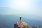 Instagram Filter Young Man Asia Tourist At Mountain Is Watching Over The Misty And Foggy Morning Sunrise, Travel Trekking Stock Photo