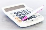 Close Up Calculator With Pen Stock Photo