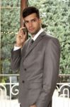 Businessman Talking On Mobile Phone Stock Photo