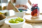 Beautiful Young Woman Preparing Breakfast At Home Stock Photo