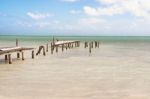 Destroyed Wooden Pier Dock And Picturesque, Relaxing Ocean View Stock Photo