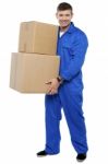 Young Man Carrying Cardboard Box Stock Photo