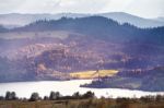 Lake Behind Foothills Of Tatra Mountains. Autumn Sunset Stock Photo