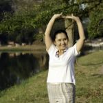 Healthy Middle Aged Woman Doing Fitness Stretching Stock Photo