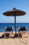 Beach Chairs On Perfect Sand Beach Stock Photo