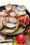 Fresh Clams On An Iron Skillet Stock Photo