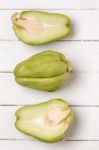 Chayote Fruit On White Wood Background Stock Photo