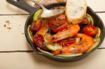 Roasted Shrimps With Zucchini And Tomatoes Stock Photo