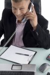 Businessman Talking Over Phone Stock Photo