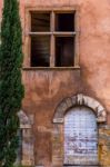 Front Of Old Stone Building With Wooden Door Stock Photo