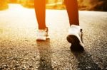 Woman Exercising Outdoor At Sunset  Stock Photo