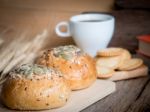 Whole Wheat Bread And Cracker With Cup Of Coffee On Wood Backgro Stock Photo