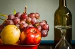 Fruits And A Glass Of Wine Stock Photo