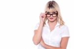 Business Lady Adjusting Spectacles Stock Photo